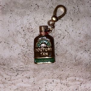 Juicy Couture sun tan bottle charm